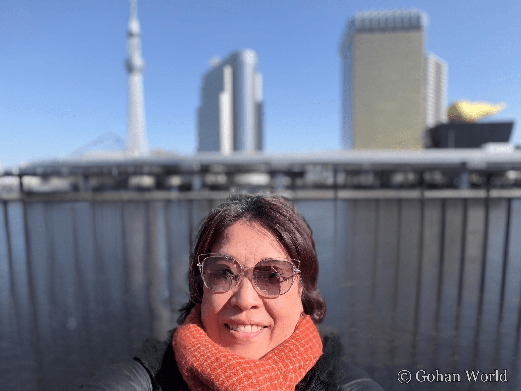 Yuko in front of the Tokyo Skytree — founder of Gohan World